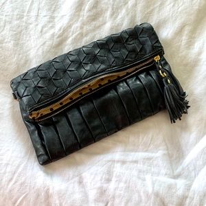 Black clutch with fringe detail